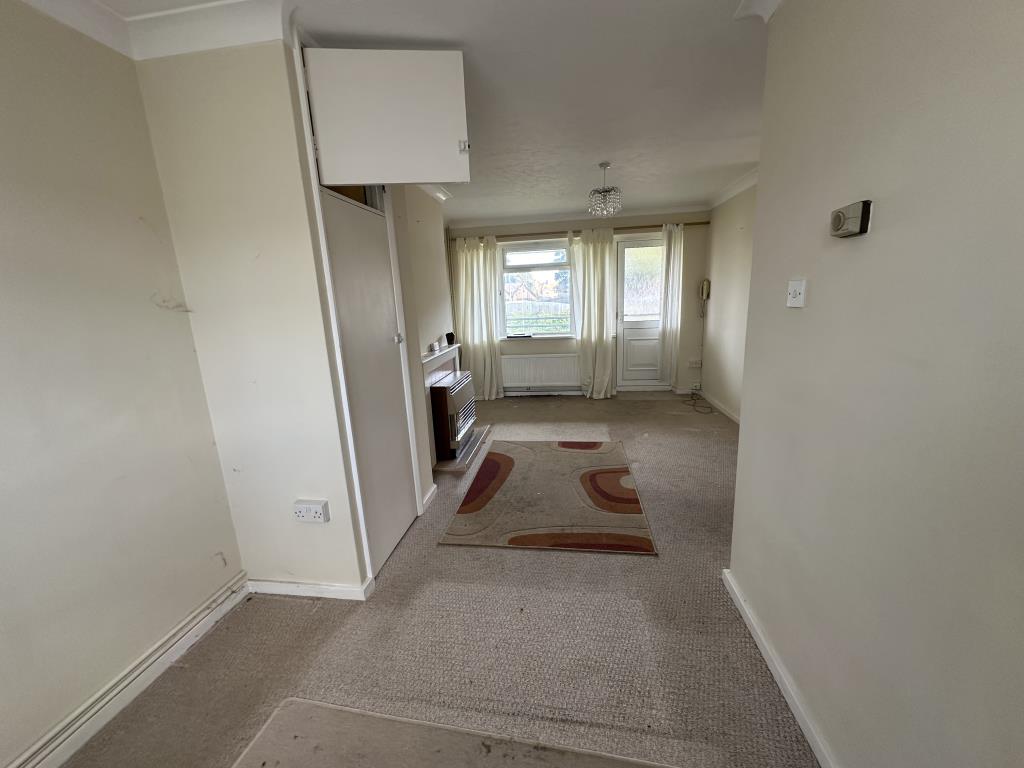 Lot: 173 - ONE-BEDROOM FLAT FOR INVESTMENT - Living room with balcony access
